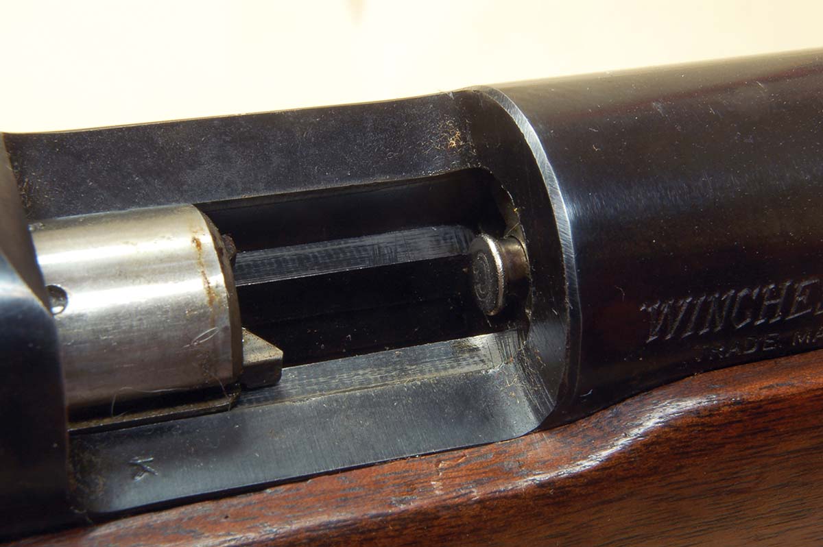 The CCI Stingers 0.1-inch longer case (center) and shorter bullet are obvious when compared to the common 22 LR on either side.